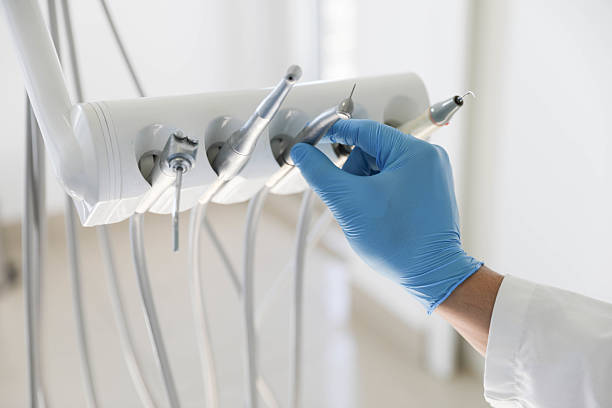 Professional Tooth Extraction technician working in Marshall County County, IN